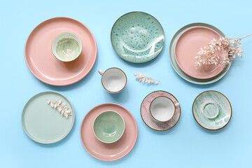 Beautiful table setting on blue background