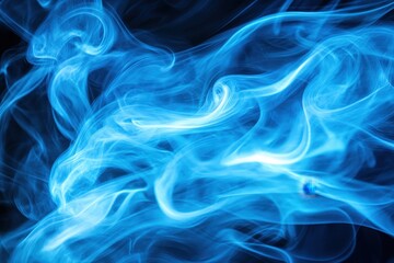 Fototapeta premium Smoke billows and shifts in blue hues under a spotlight against a black background, Smoke clears in the spotlight on black background