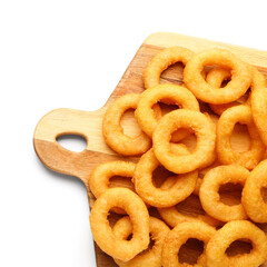 Wooden board with fried breaded onion rings on white background
