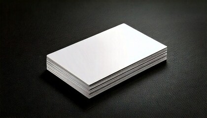 A set of stationery samples including business cards, A4 paper, and envelopes, all blank, top-down view, white background