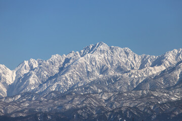 The Tateyama Mountain Range is part of the Hida Mountains, also known as the Japanese Northern Alps, in winter.