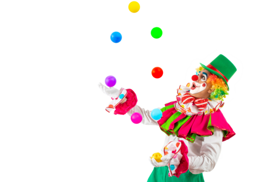 Surprised juggler clown juggling balls in the circus, man entertainer as Joker in a suit and wig, with clown whiteface makeup. Trickster, jester, pantomime, mime, and a professional actor at events