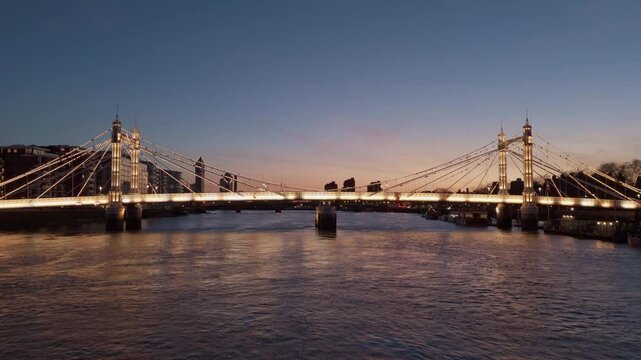 Albert Bridge and Thames River aerial shot at dusk in London