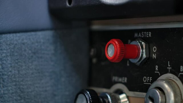 Pilot Engages Master Push-Pull Switch of General Aviation Airplane CU