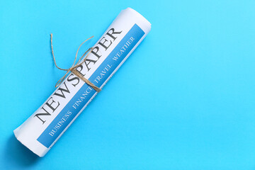 Modern newspaper on blue background