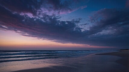 Fototapeta premium Ocean Beach at Dusk Waves Rolling Under a Colorful Sky