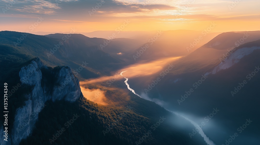 Poster a golden hour mountain range with a river of glowing mist flowing through