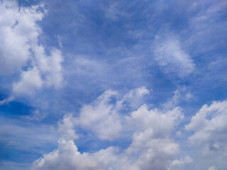 Bright Blue Sky with Moving White Clouds