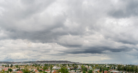 Fototapeta premium Snow-capped mountain shrouded in clouds. View of Mount in Antalya Province, Türkiye.