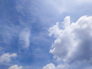 Bright Blue Sky with Moving White Clouds