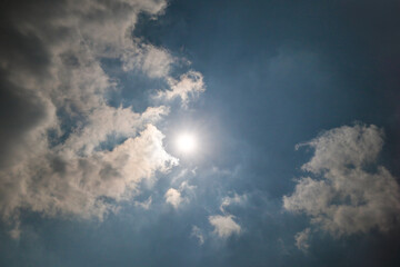 Obraz premium The shining sun among the clouds
