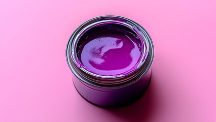 The open metal container of rich purple paint, set for application, inspires creativity and home makeovers