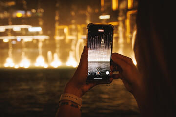 Shooting Dubai Fountain light show via mobile phone.