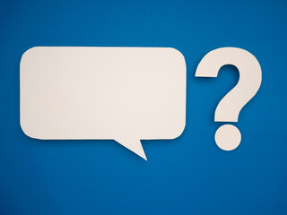 Blank speech bubble and white question mark on blue background.
