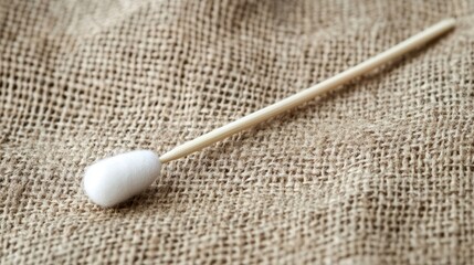 Eco-friendly bamboo cotton swab on burlap fabric