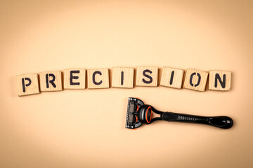 Precision Concept. Wooden Blocks and Razor on Beige Background