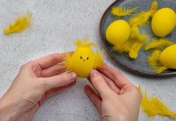How to make a chick from eggs for Easter decor. Handmade decoration Easter egg chick. Step by step instructions. Children DIY concept. Step 12. The handicraft is ready.
