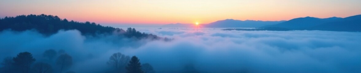 Fototapeta premium Softly glowing blue mist rises from a serene landscape at dawn , light blue abstract background, fog, gentle