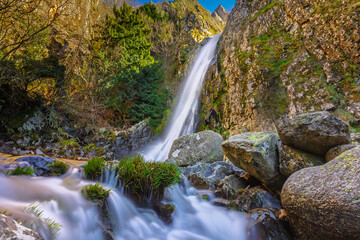 Emblematic beautifull waterfall of the Serra da Estrela Natural Park in Portugal - Pit of Hell Cascade (Poço do Inferno in portuguese language)
