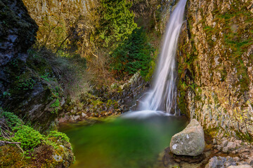 Emblematic beautifull waterfall of the Serra da Estrela Natural Park in Portugal - Pit of Hell Cascade (Poço do Inferno in portuguese language)