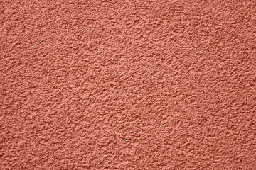 rose pastel tone red stucco wall pattern. Abstract construction design background. fence fragment. light pink plaster Wall Texture. Pastel Backdrop. Abstract Painted Wall Surface. Copy Space concrete