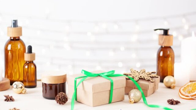 Christmas cosmetic product display and Christmas decorationson white background. Close up, copy space