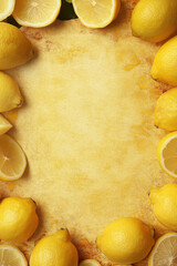 a yellow background with cut and full lemons in the corners