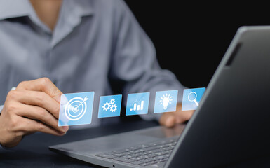 Concept of business strategy and future sustainable business finance action plan. Touching target board for creative and set up business objective target and success and business goals concept.