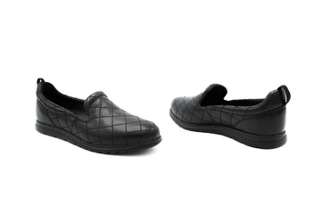 Fashionable leather quilted shoes isolated on white background. View from all sides. Moccasins. Loafers.