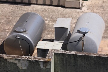 Rooftop water tanks in Sicily, Italy