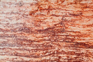 Honed red travertine natural stone slab background