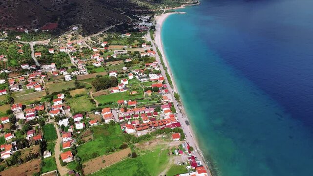 Drone Shot Capturing the Landscape of a Village Nestled Amidst Cultivated Fields and Mountains. Datca, Mugla, Turkey