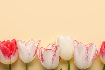 Beautiful tulip flowers on yellow background. Mother's Day celebration