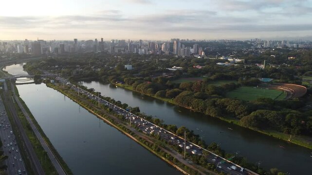 Amazing megalopolis S&atilde;o Paulo Latin America with sunrise on the Pinheiros River along the marginal highway