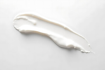 Applying smooth cream texture on white surface close-up photography minimalist environment