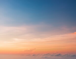  blurred of cloud background with a pastel colored orange to blue gradient. 