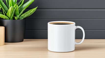 White coffee mug on a light wood table next to a succulent plant in a black pot against a dark gray background.