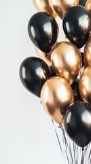 Elegant celebration with black and gold balloons against neutral backdrop