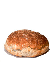 Freshly baked round bread isolated on a white background.