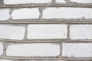 Brick wall background. White brick texture. Rustic wall backdrop. Old surface. Vintage pattern.