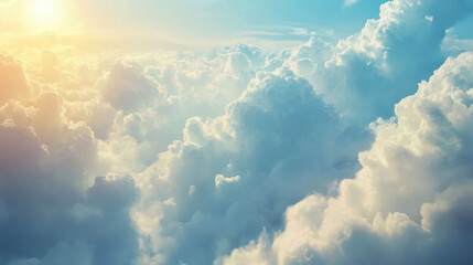 Fototapeta premium breathtaking view of fluffy clouds illuminated by sunlight, creating serene and peaceful atmosphere. soft hues of blue and white evoke sense of tranquility and wonder