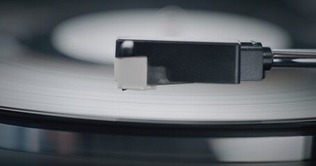 Vinyl Record Rotating On Retro Turntable. Stylus Needle Touching Grooves, Playing Sound on Vinyl...