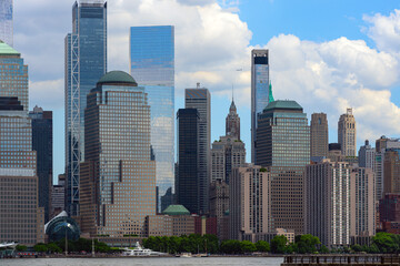 Fototapeta premium New York City. NYC skyline with towering skyscrapers. Manhattan and Hudson River. Panoramic cityscape of New York. Downtown NYC with landmarks. New York skyline. New York cityscape.