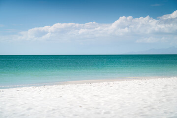 Tropical island in the Caribbean Sea with turquoise water and white sand, Coche, Venezuela. A paradise holiday in South America.
