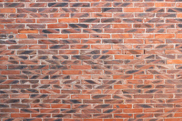 Obraz premium red brick wall at square format as background and texture