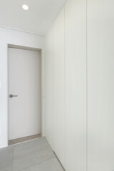 I installed a bunch of shoe racks right next to the entrance