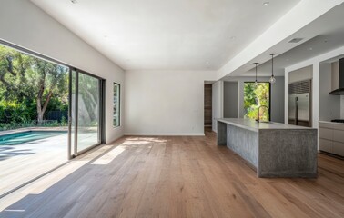 Fototapeta premium Modern Interior with Concrete Island, Wood Floors, and Pool View