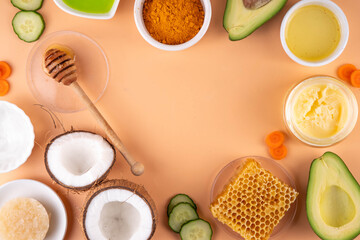 DIY Natural Sunscreen Alternative, Anti-Sunscreen Movement. Natural organic SPF ingredients background with olive oil, coconut oil, cocoa butter, aloe gel, beeswax, carrot seed oil