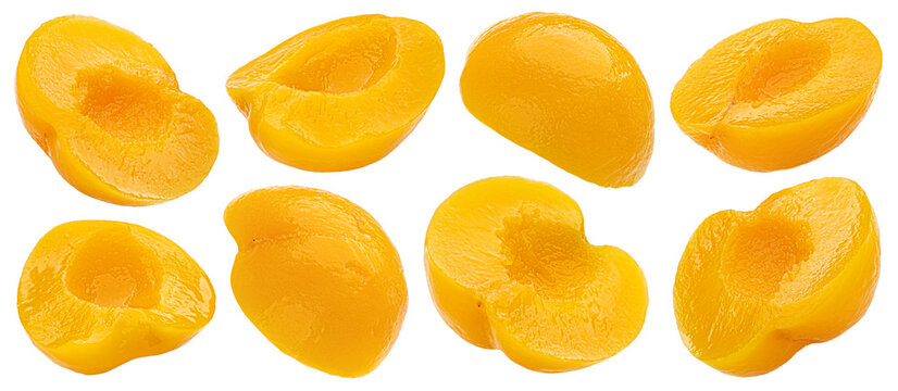 Canned peach or apricot fruit halves isolated on white background with clipping path, package design element