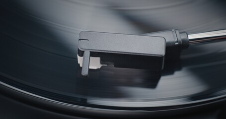 Vinyl Record Rotating On Retro Turntable. Stylus Needle Touching Grooves, Playing Sound on Vinyl...